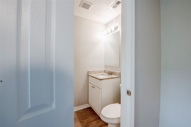 4559 W Gore Ave, Orlando, FL 32811 - bathroom with vanity and wood finished floors