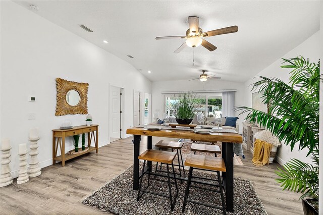 139 Douglas St, Edgewater, FL 32141 - dining room featuring vaulted ceiling, light wood-style flooring, a ceiling fan, and recessed lighting