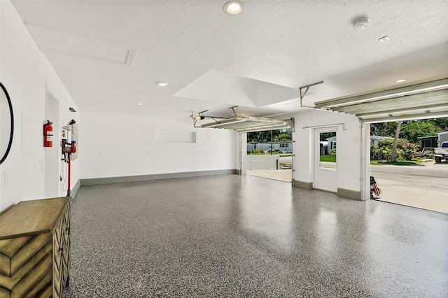 139 Douglas St, Edgewater, FL 32141 - garage with baseboards and recessed lighting