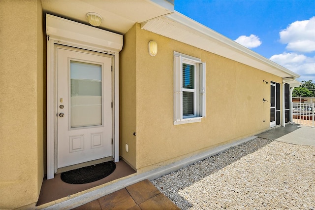 139 Douglas St, Edgewater, FL 32141 - view of exterior entry with stucco siding