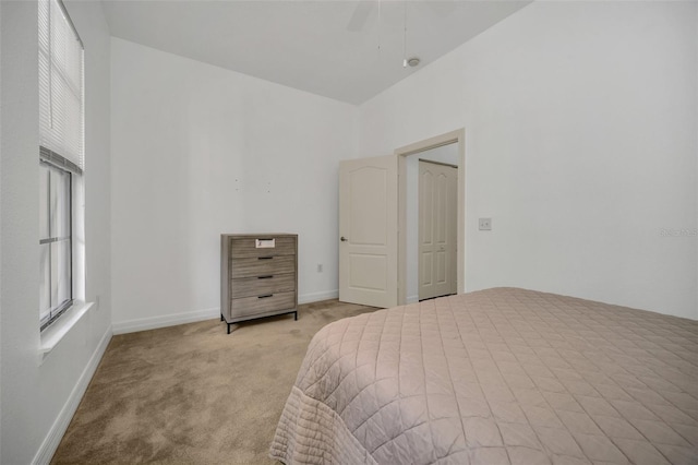506 Mirasol Cir Unit 202, Celebration, FL 34747 - bedroom with light colored carpet and ceiling fan