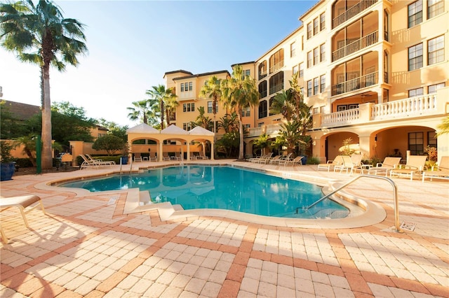 506 Mirasol Cir Unit 202, Celebration, FL 34747 - community pool featuring a patio