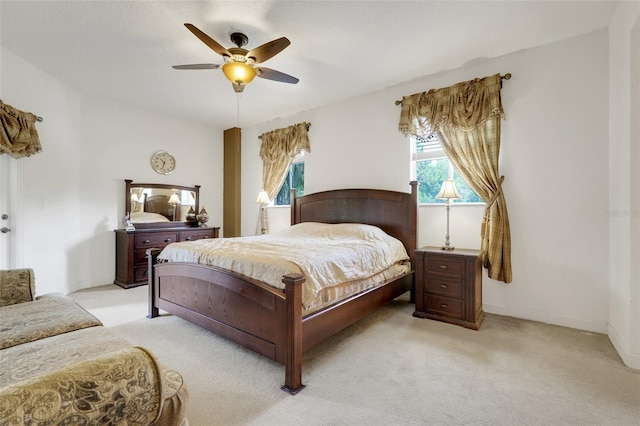 6336 Buford St Unit 209, Orlando, FL 32835 - bedroom with light carpet and a ceiling fan