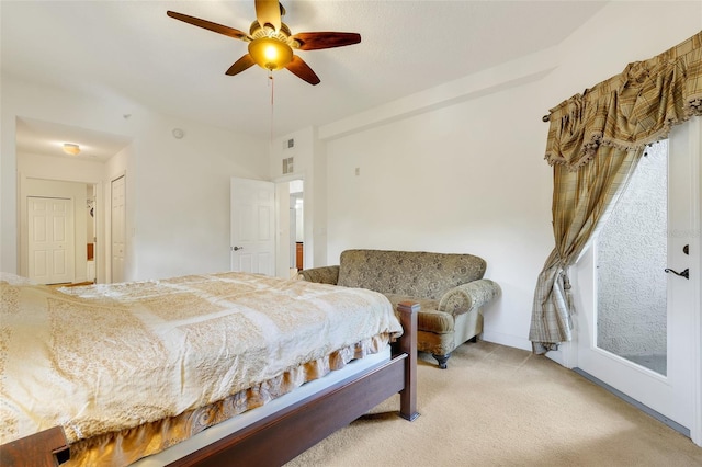 6336 Buford St Unit 209, Orlando, FL 32835 - bedroom featuring light colored carpet and a ceiling fan