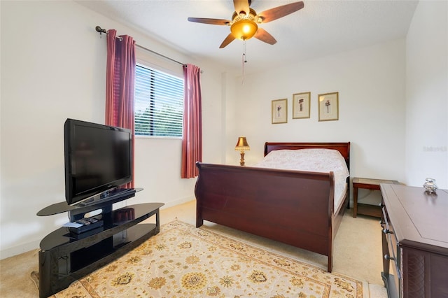 6336 Buford St Unit 209, Orlando, FL 32835 - carpeted bedroom with baseboards and ceiling fan
