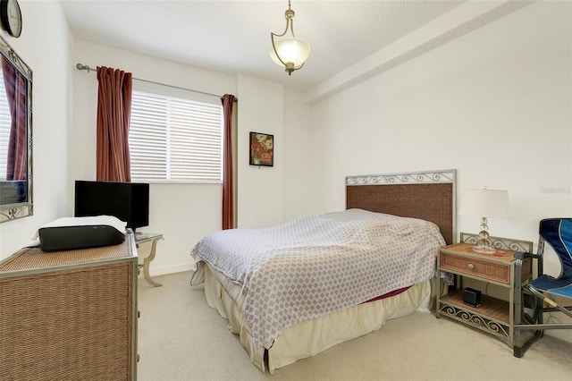 6336 Buford St Unit 209, Orlando, FL 32835 - bedroom with light carpet and multiple windows