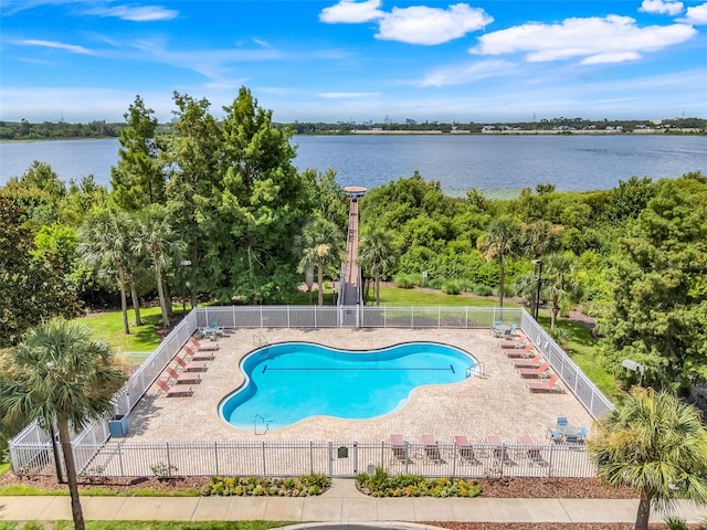 6336 Buford St Unit 209, Orlando, FL 32835 - community pool featuring a water view, a patio area, and view of scattered trees