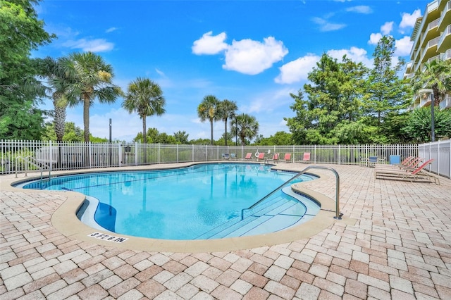 6336 Buford St Unit 209, Orlando, FL 32835 - community pool featuring a patio