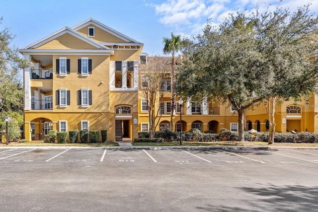 3707 Conroy Rd Unit 1715, Orlando, FL 32839 - view of property featuring uncovered parking