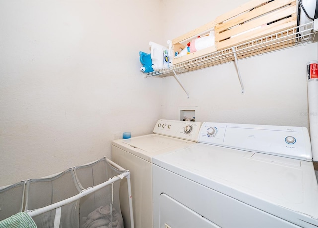 3707 Conroy Rd Unit 1715, Orlando, FL 32839 - laundry area with washer and clothes dryer