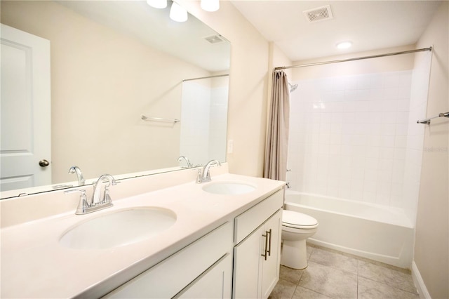 1023 Sugarwood St, Davenport, FL 33837 - bathroom with double vanity, shower / tub combo, and tile patterned floors