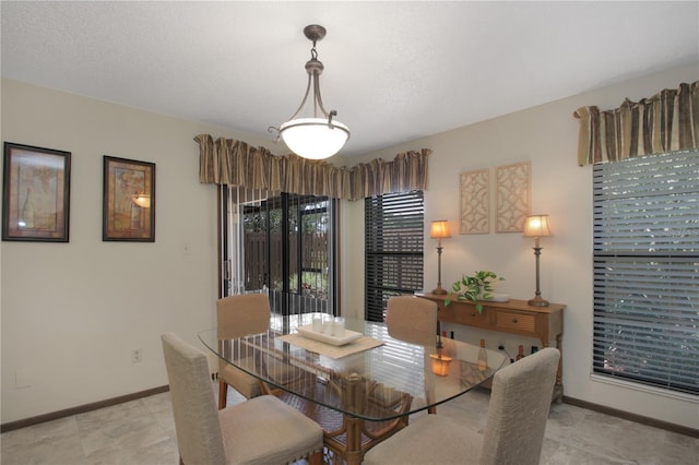 199 Heron Bay Cir, Lake Mary, FL 32746 - dining room featuring baseboards