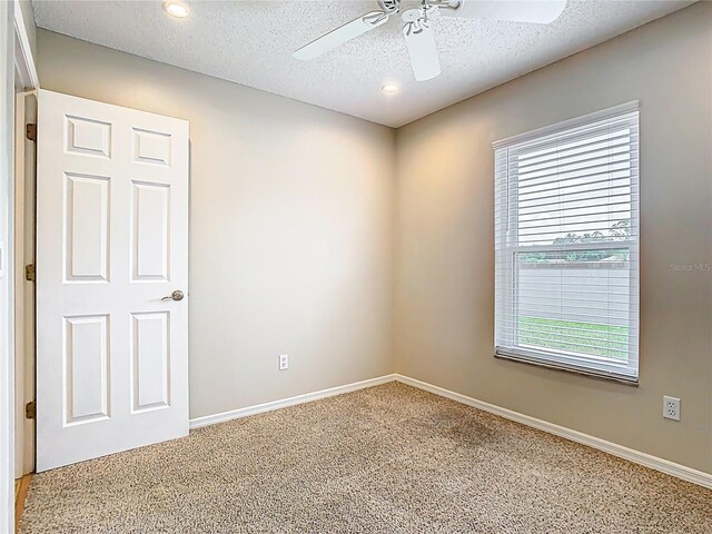 2641 Delcrest Dr, Orlando, FL 32817 - carpeted empty room with ceiling fan, healthy amount of natural light, a textured ceiling, and recessed lighting