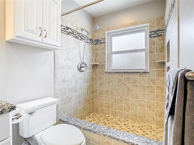 2641 Delcrest Dr, Orlando, FL 32817 - full bathroom featuring a tile shower and toilet