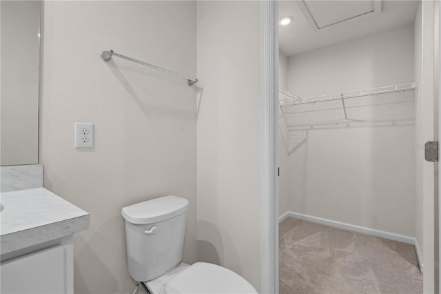 275 Blueberry Ln, Davenport, FL 33837 - bathroom featuring vanity and a walk in closet