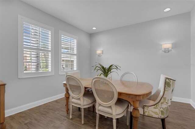 32004 Redtail Reserve Blvd, Sorrento, FL 32776 - dining space featuring wood finished floors and recessed lighting