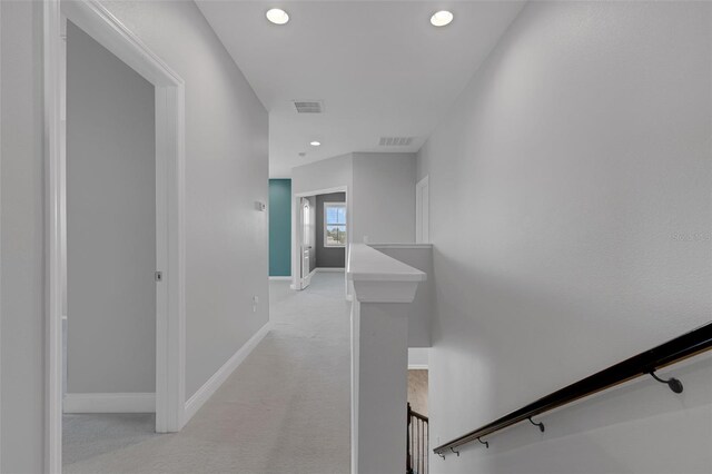 32004 Redtail Reserve Blvd, Sorrento, FL 32776 - corridor featuring an upstairs landing, light colored carpet, and recessed lighting