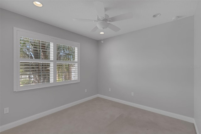 32004 Redtail Reserve Blvd, Sorrento, FL 32776 - carpeted spare room featuring ceiling fan, recessed lighting, and a smoke detector