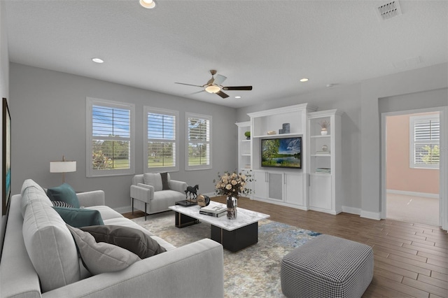 32004 Redtail Reserve Blvd, Sorrento, FL 32776 - living room featuring wood finished floors, a ceiling fan, and recessed lighting