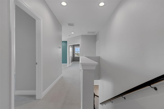 32004 Redtail Reserve Blvd, Sorrento, FL 32776 - corridor featuring light carpet, an upstairs landing, and recessed lighting