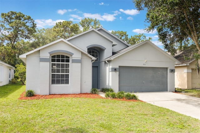 2767 Aragon Ter, Lake Mary, FL 32746 - view of front of house with a garage, concrete driveway, stucco siding, and a front yard