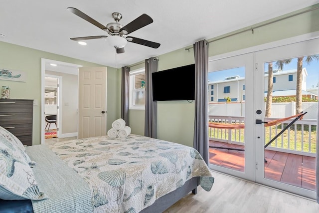 4311 123rd St W, Cortez, FL 34215 - bedroom featuring access to outside, wood finished floors, and ceiling fan