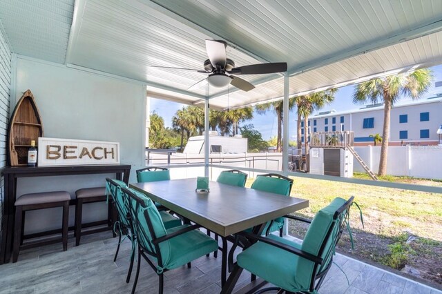 4311 123rd St W, Cortez, FL 34215 - view of patio / terrace with a ceiling fan and outdoor dining space