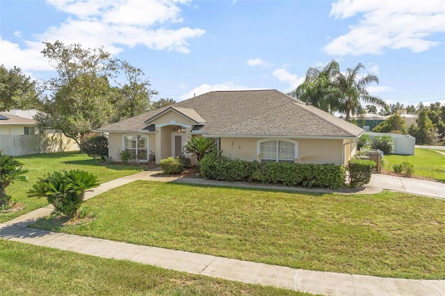 710 Independence Dr, Orange City, FL 32763 - view of front facade featuring stucco siding and roof with shingles