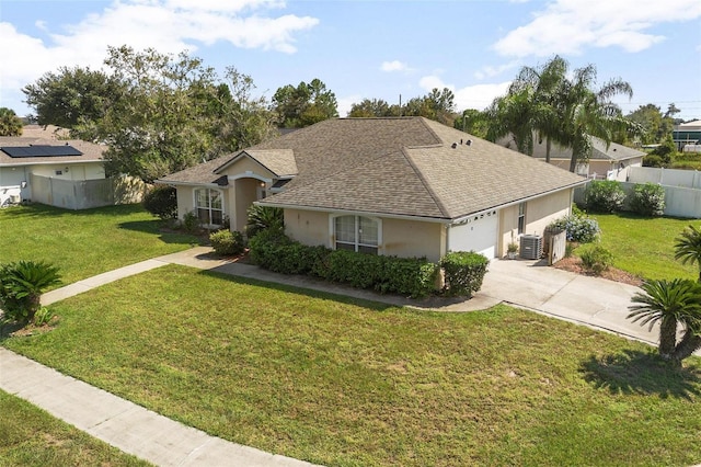 710 Independence Dr, Orange City, FL 32763 - single story home with roof with shingles, stucco siding, driveway, and a garage