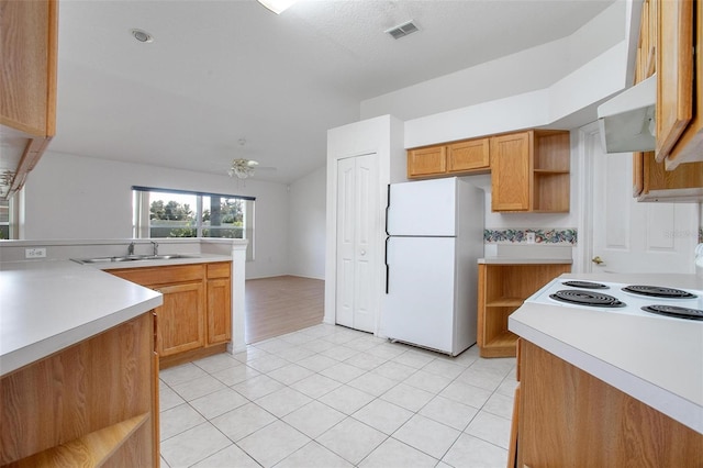 710 Independence Dr, Orange City, FL 32763 - kitchen featuring white appliances, open shelves, light countertops, and light tile patterned floors