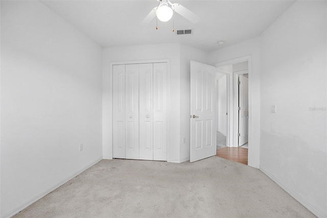 710 Independence Dr, Orange City, FL 32763 - unfurnished bedroom with carpet, a closet, and ceiling fan