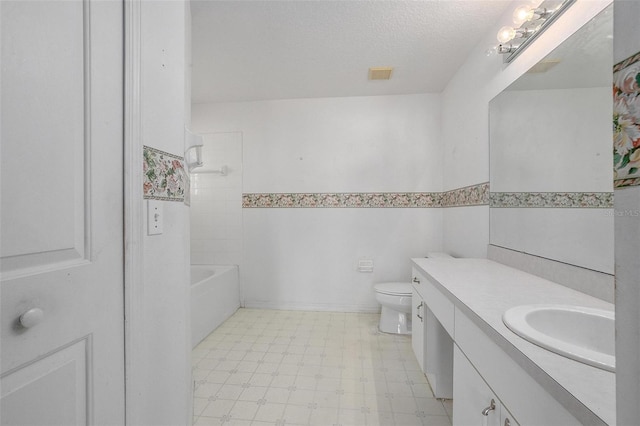 710 Independence Dr, Orange City, FL 32763 - full bathroom featuring vanity, tile patterned floors, a wainscoted wall, a textured ceiling, and shower / bathtub combination