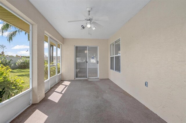 710 Independence Dr, Orange City, FL 32763 - unfurnished sunroom with ceiling fan and carpet