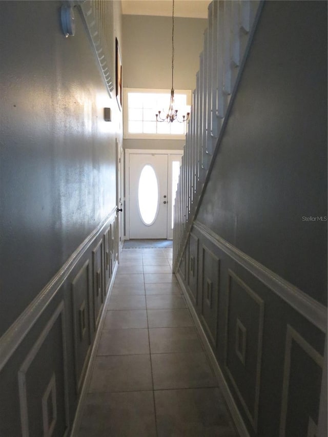 1420 Center St, Ocoee, FL 34761 - entryway featuring a chandelier and tile patterned floors