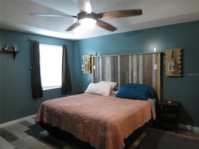 1420 Center St, Ocoee, FL 34761 - bedroom featuring a ceiling fan and wood finished floors