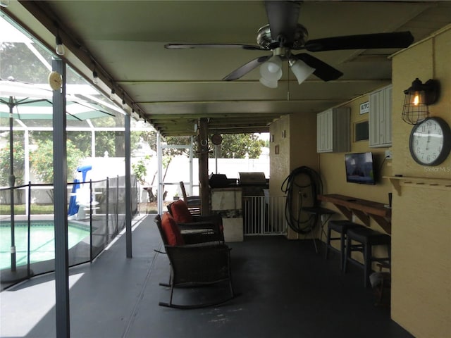 1420 Center St, Ocoee, FL 34761 - view of patio / terrace featuring ceiling fan and glass enclosure