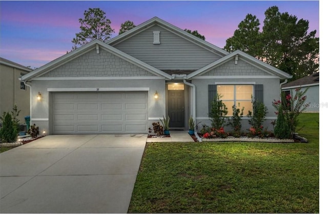 133 Hickory Course Cir, Ocala, FL 34472 - view of front of house with an attached garage, driveway, stucco siding, and a front lawn