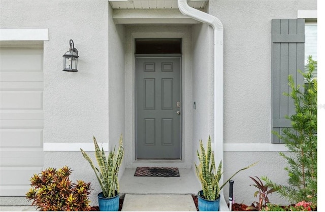 133 Hickory Course Cir, Ocala, FL 34472 - view of exterior entry with stucco siding