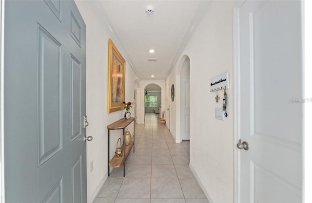 133 Hickory Course Cir, Ocala, FL 34472 - hallway with arched walkways, light tile patterned floors, and recessed lighting
