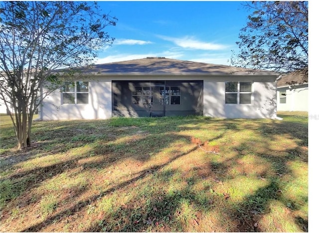 133 Hickory Course Cir, Ocala, FL 34472 - rear view of property featuring a yard and stucco siding