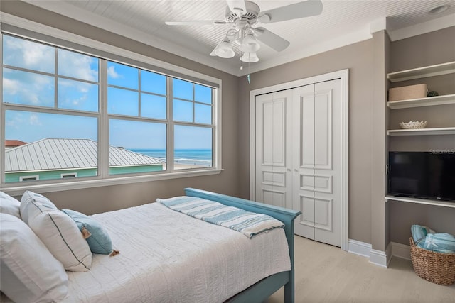 3309 Hill St, New Smyrna Beach, FL 32169 - bedroom featuring a closet, light wood-type flooring, and ceiling fan