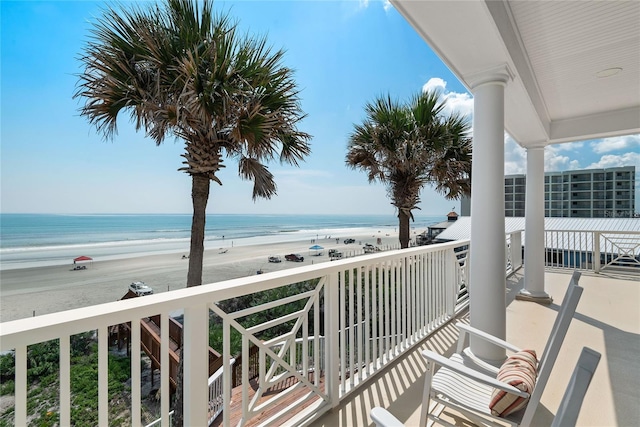 3309 Hill St, New Smyrna Beach, FL 32169 - balcony featuring view of water and beach