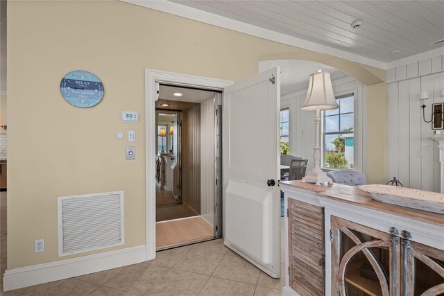 3309 Hill St, New Smyrna Beach, FL 32169 - bathroom featuring tile patterned floors and wooden ceiling