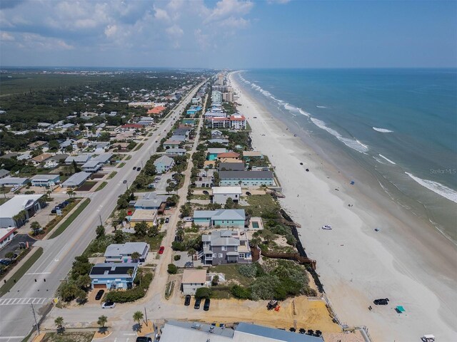3309 Hill St, New Smyrna Beach, FL 32169 - aerial view of waterfront with a beach