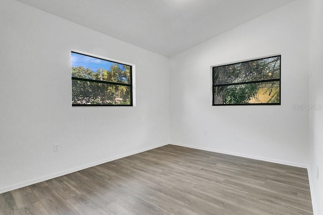 1148 Northcrest Dr, Apopka, FL 32703 - spare room featuring wood finished floors and baseboards