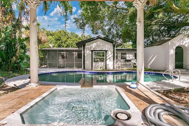 1148 Northcrest Dr, Apopka, FL 32703 - outdoor pool with an in-ground hot tub and a sunroom