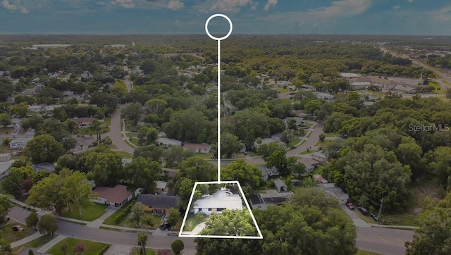 1148 Northcrest Dr, Apopka, FL 32703 - aerial perspective of suburban area with property parcel outlined and a forest