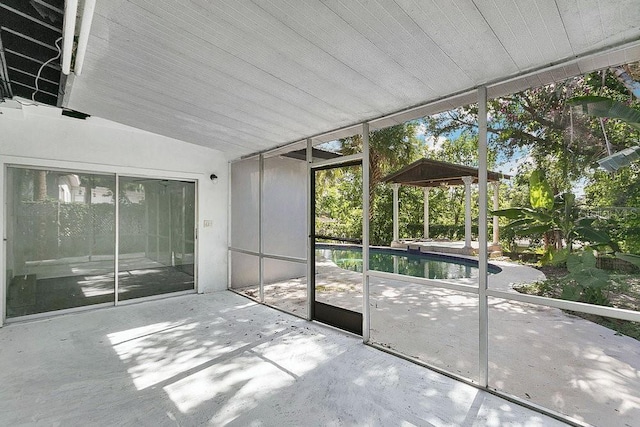 1148 Northcrest Dr, Apopka, FL 32703 - unfurnished sunroom featuring lofted ceiling