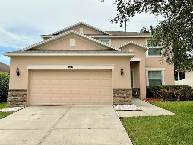 5917 Coquyt Dr, Mount Dora, FL 32757 - view of front facade featuring stone siding, stucco siding, and driveway