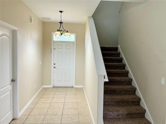 5917 Coquyt Dr, Mount Dora, FL 32757 - entryway with stairway and light tile patterned floors